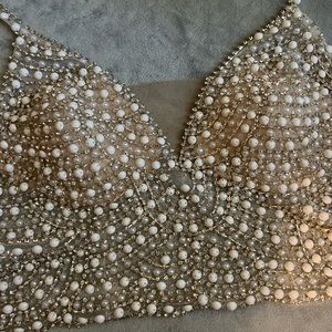 Brand new!! David’s bridal pearl sheer bridal top. Size 4